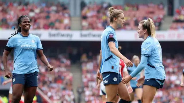 Vivianne Miedema is congratulated by Lauren Hemp and Bunny Shaw for her then equalising goal v Arsenal