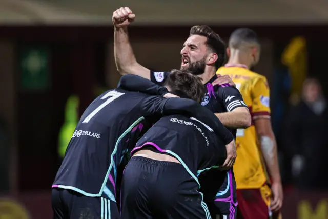 Aberdeen captain Graeme Shinnie celebrates at Fir Park