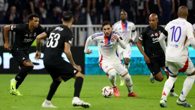 Rayan Cherki runs with the ball for Lyon