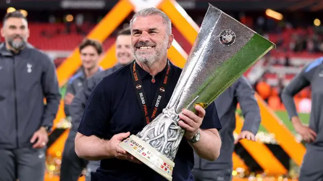 Ange Postecoglou with trophy