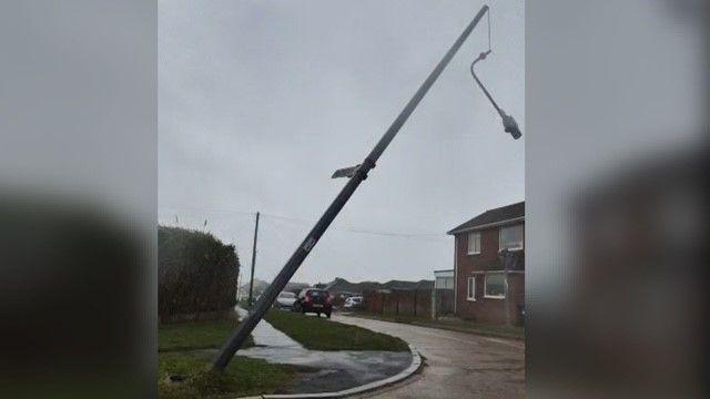 a fallen lamp post in Peacehaven, East Sussex