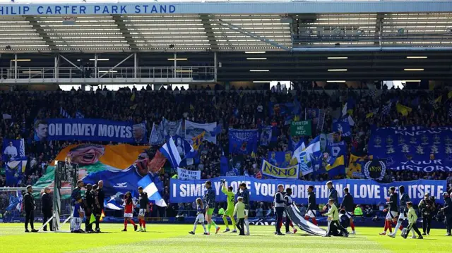 Everton fans with banners at Goodison Park