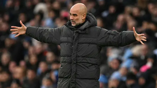 Pep Guardiola gestures