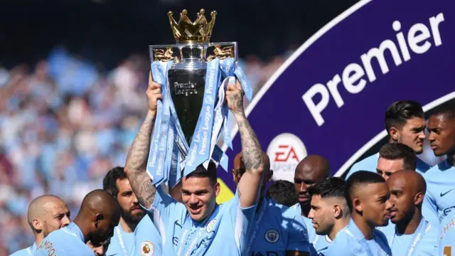 Ederson with the 2017-18 Premier League trophy