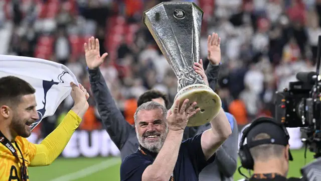 Ange Postecoglou lifts Europa League trophy