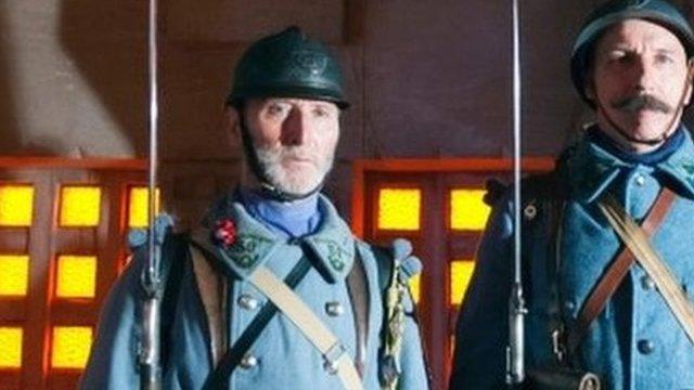 Men wearing military uniforms of the 56th and 59th light infantry battalions pose during a ceremony marking the centenary of the beginning of the battle of Verdun (21 February 2016)