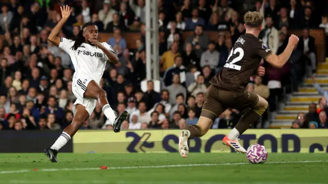 Fulham's Alex Iwobi scores against Brentford