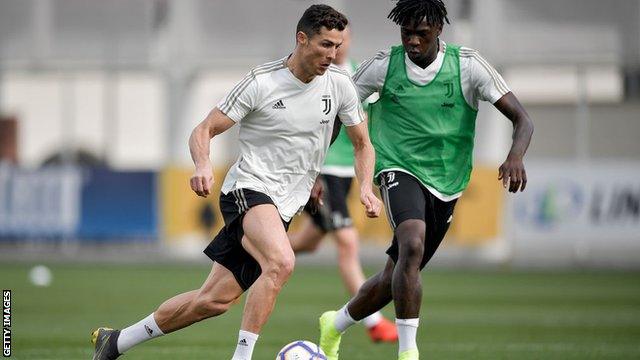 Cristiano Ronaldo and Moise Kean in training with Juventus