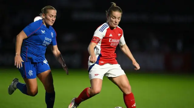 Kim Little of Arsenal controls the ball whilst under pressure from Katie Wilkinson of Rangers FC during the UEFA Women's Champions League 2024/25 First Round Mini-Tournament match between Arsenal FC and Rangers FC at Meadow Park on September 04, 2024