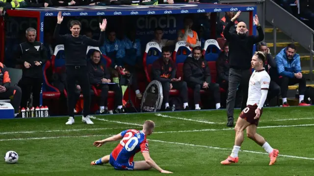 Pep Guardiola and Adam Wharton