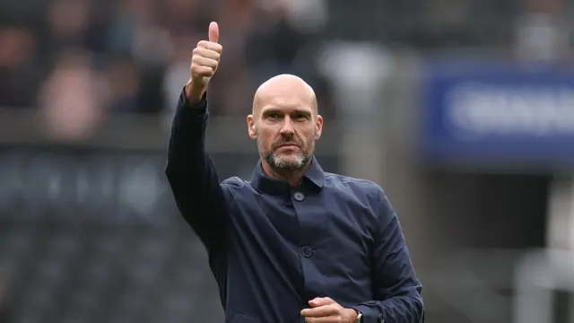 Swansea head coach Luke Williams waves to fans