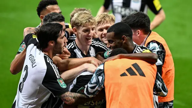 Newcastle United players celebrate goal against Chelsea