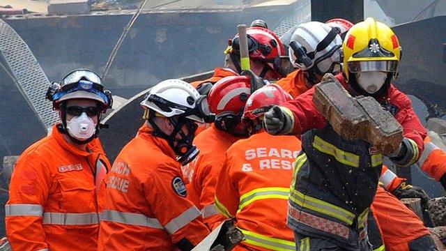 A rescue team searches the Bosley explosion site