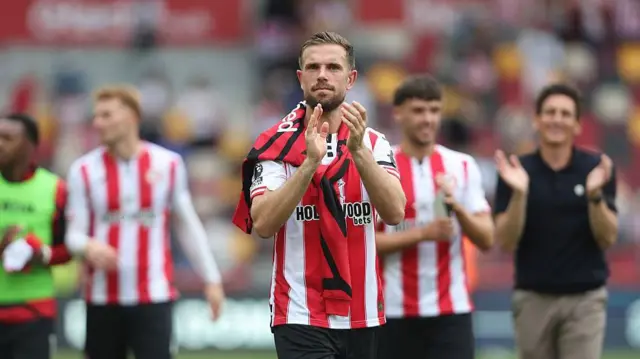 Jordan Henderson applauds Brentford fans