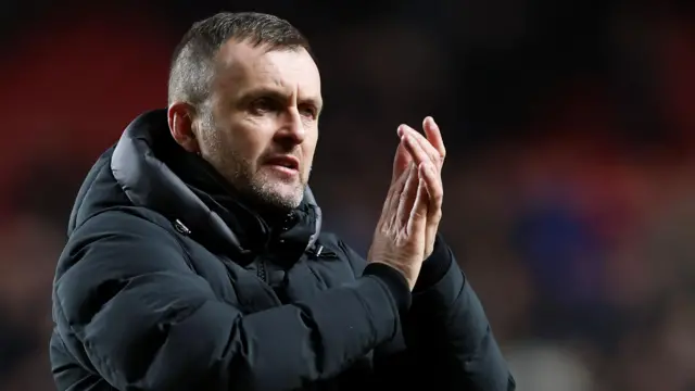 Nathan Jones applauds