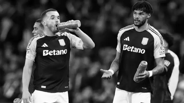 John McGinn and Tyrone Mings in action for Aston Villa