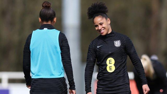 Demi Stokes smiles at training