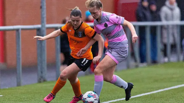 Glasgow City's Emily Whelan and Partick Thistle's Jenna Ferguson battle for the ball