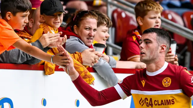 Lennon Miller high-fives Motherwell fan