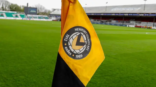 Newport County crest on corner flag at Rodney Parade