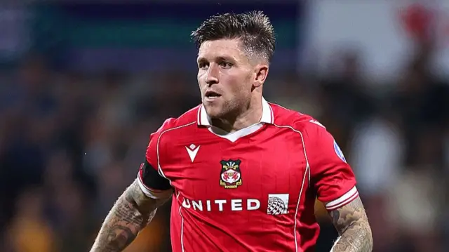 Wrexham forward Josh Windass in action