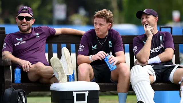 Brendon McCullum, left, with Ollie Pope and Joe Root