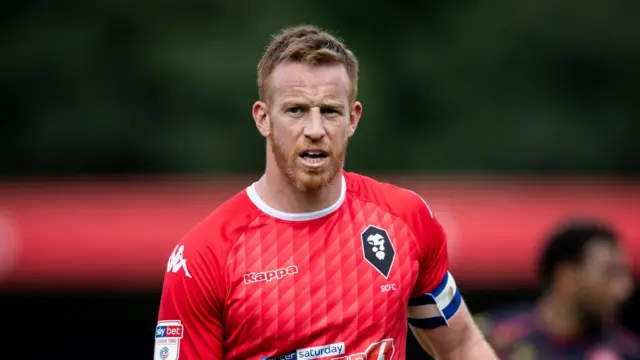 Former Stoke City striker Adam Rooney captains Salford City