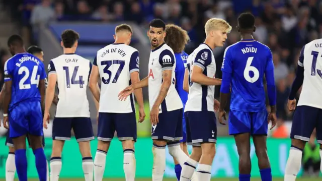 Tottenham players take up position during their Premier League opener with Tottenham