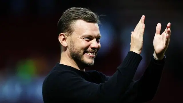 Alfred Johansson claps Motherwell supporters