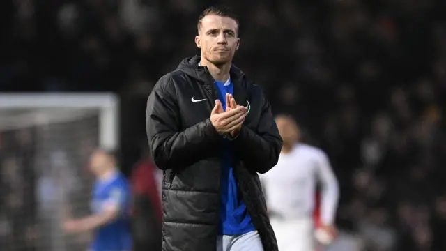Portsmouth defender Conor Shaughnessy applauds the Pompey fans after the Blues were knocked out of the FA Cup by Arsenal