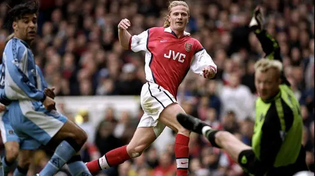 Emmanuel Petit plays for Arsenal against Aston Villa