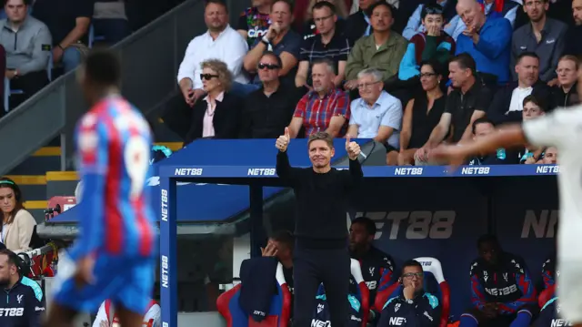 Palace boss Oliver Glasner gives his side a thumbs up from the touchline