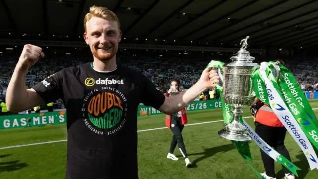 Celtic's Liam Scales with the Scottish Cup