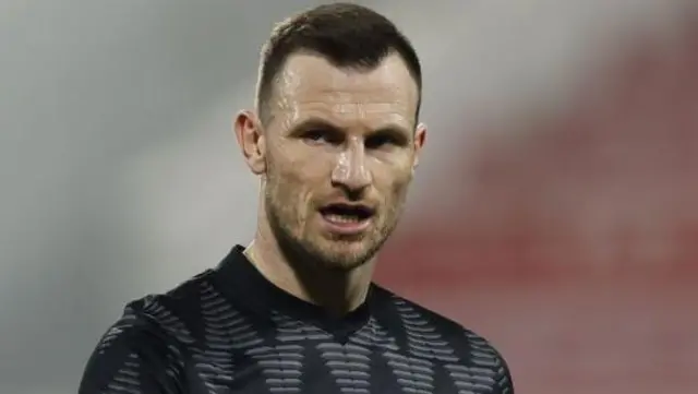 Tommy Smith in a black shirt playing for New Zealand