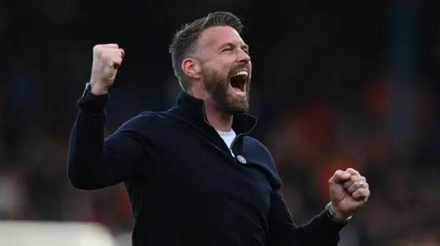 Luton boss Rob Edwards celebrates at full-time after their win over Bournemouth