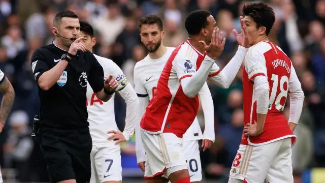 Michael Oliver gives VAR signal