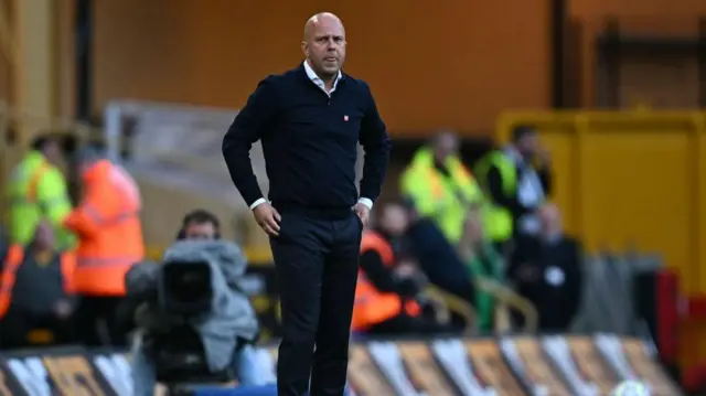 Liverpool's Dutch manager Arne Slot reacts during the English Premier League football match between Wolverhampton Wanderers and Liverpool at the Molineux stadium 