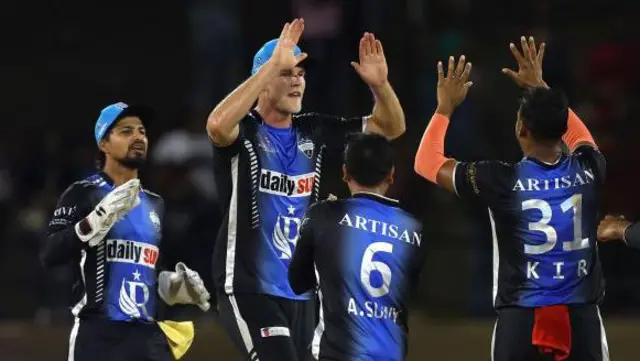 Rangpur celebrate taking a wicket against Victoria