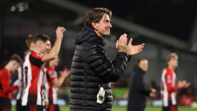 Thomas Frank, Manager of Brentford, applauds the fans after the Premier League match between Brentford FC and Leicester City FC at Gtech Community Stadium on November 30, 2024