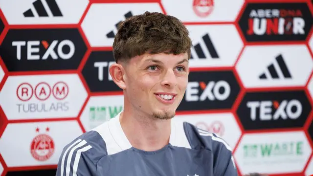 Aberdeen midfielder Leighton Clarkson speaking at a media conference