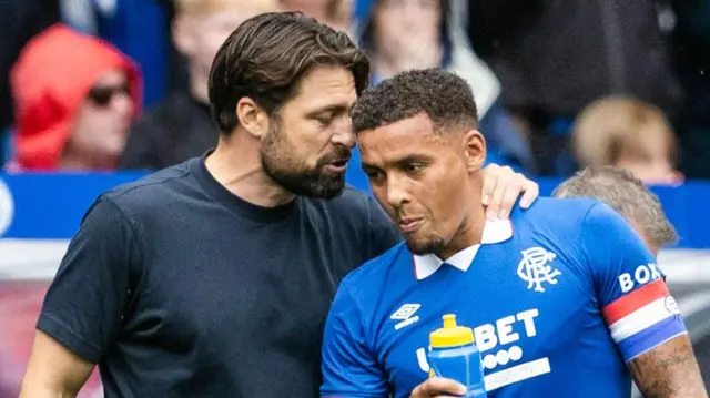 Rangers head coach Russell Martin (L) and James Tavernier during a pre-season friendly match between Rangers and Club Brugge at Ibrox Stadium