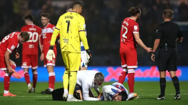 Ilias Chair receiving treatment after being injured against Middlesbrough on Tuesday