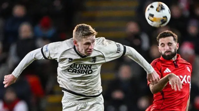 Dundee United's Zac Sapsford and Aberdeen's Graeme Shinnie