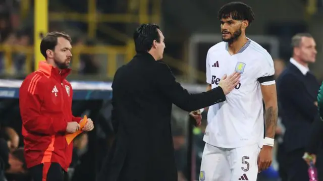 Tyrone Mings and Unai Emery