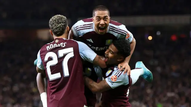 Aston Villa players celebrate goal