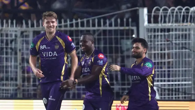 Kolkata Knight Riders' Cam Green (left) celebrates a wicket with Rovman Powell (centre) and Rinku Singh 