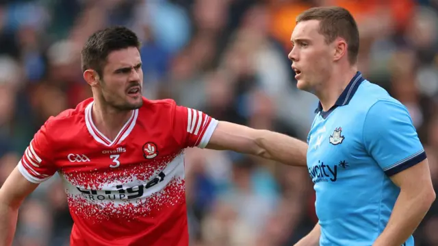 Chrissy McKaigue in action against Derry