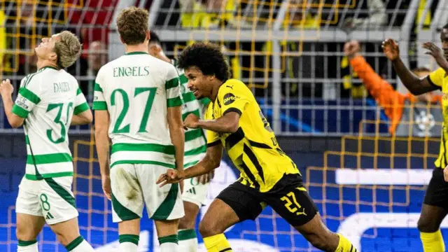 DORTMUND, GERMANY - OCTOBER 01: Borussia Dortmund's Karim Adeyemi celebrates scoring to make it 5-1 during a UEFA Champions League matchday two League Phase match between Borussia Dortmund and Celtic at the Signal Iduna Park, on October 01, 2024, in Dortmund, Germany. (Photo by Craig Williamson / SNS Group)