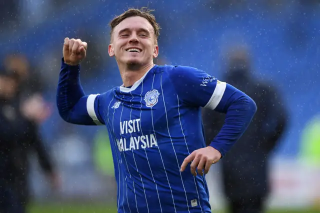 Isaak Davies celebrating with the fans after a Cardiff win.