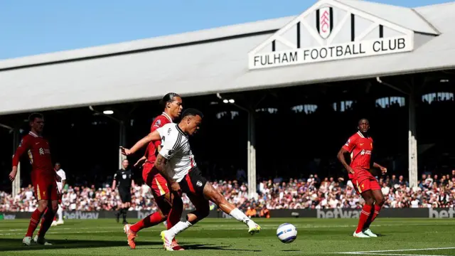 Rodrigo Muniz scores for Fulham against Liverpool in April